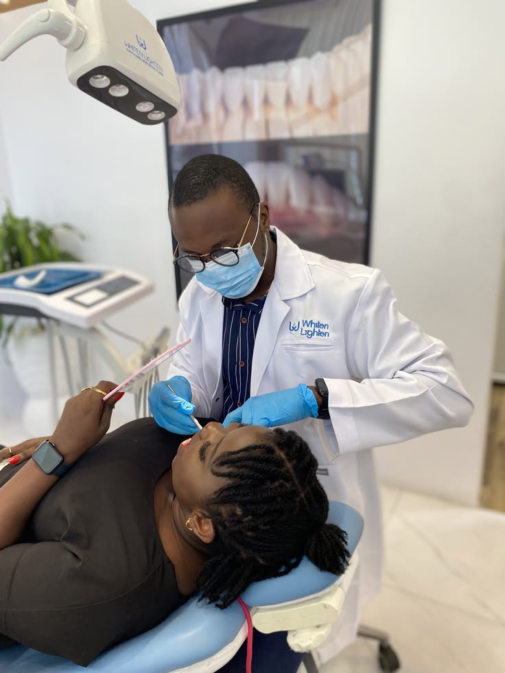 Dentist treating patient